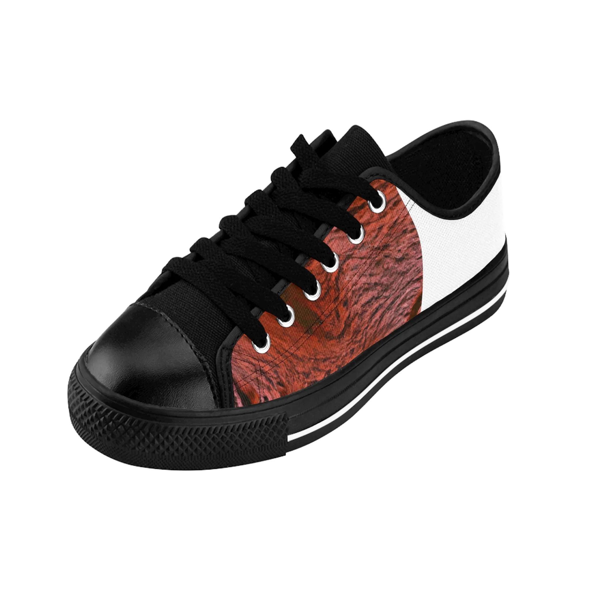 Fernando del Marquesa, the esteemed Spanish aristocrat and shoe designer of the 1500s. A master of fine leatherwork and embroidery, Fernando's shoes were sought after and admired by the most stylish and discerning of-low top